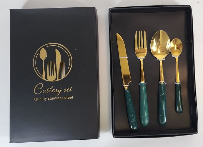 M1bt8pr948kJHgsqDHlcjViDNSZqc05v0isSXMlX (1) Kitchen Stainless Steel Cutlery Gold and Green 4 PCS Set - Stainless Steel - Plastic Handle - Gift Pack - Image 1